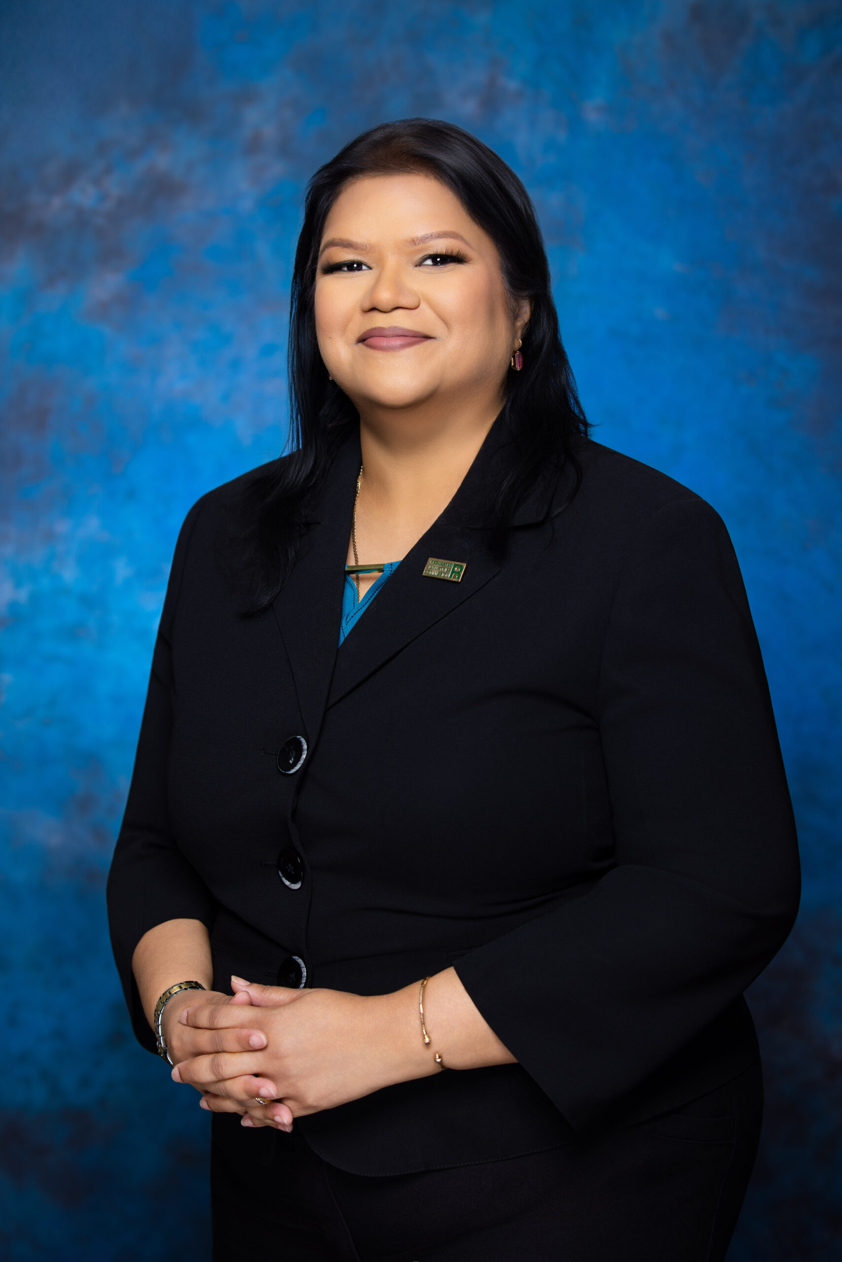 Ms. Nisha Persad